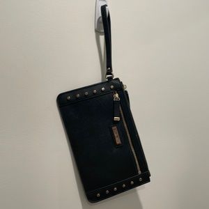 Black Calvin Klein wristlet with gold studs